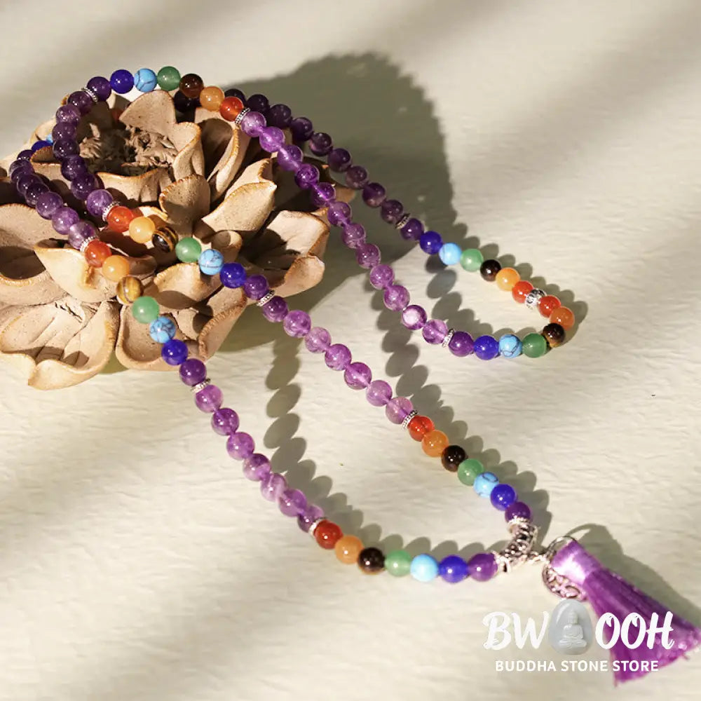 A BWOOOH 108-bead mala featuring 6mm polished Amethyst, lustrous Tiger Eye, and grounding Volcanic stones, styled as a multilayer bracelet and necklace for meditation and 7 Chakra healing. - View 3