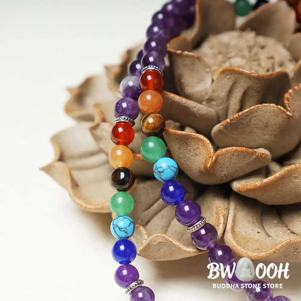 A BWOOOH 108-bead mala featuring 6mm polished Amethyst, lustrous Tiger Eye, and grounding Volcanic stones, styled as a multilayer bracelet and necklace for meditation and 7 Chakra healing. - View 5
