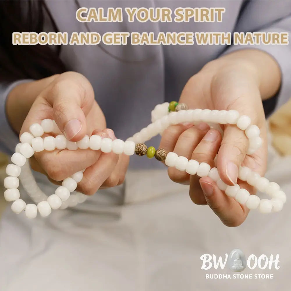BWOOOH Bodhi Lotus Mala necklace, handcrafted with 108 natural Bodhi seeds (mix of 6x8mm and 8x10mm) and a central, delicate Lotus flower pendant. This spiritual meditation tool, designed for serenity and mindfulness, is artfully displayed with its accompanying gift message card. Promotes enlightenment, peace, and resilience. - View 25