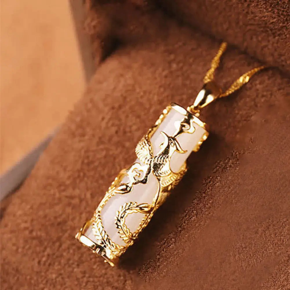 BWOOOH Jade Dragon Phoenix Copper Blessing Harmony Necklace Pendant, showcasing a vivid green jade stone intricately carved with dragon and phoenix symbols, paired with a shimmering copper chain. Spiritual amulet for balance and protection. - View 4