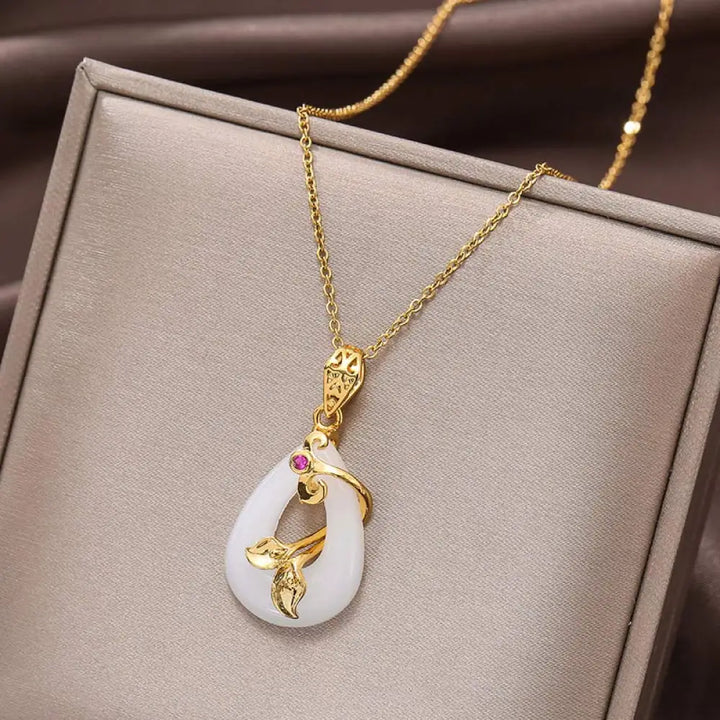 BWOOOH handmade Oval Jade Blessing Fortune Necklace Pendant, featuring a smooth, polished green jade oval on a shimmering titanium steel chain. Symbolizes prosperity, mental clarity, and improved sleep. - View 4