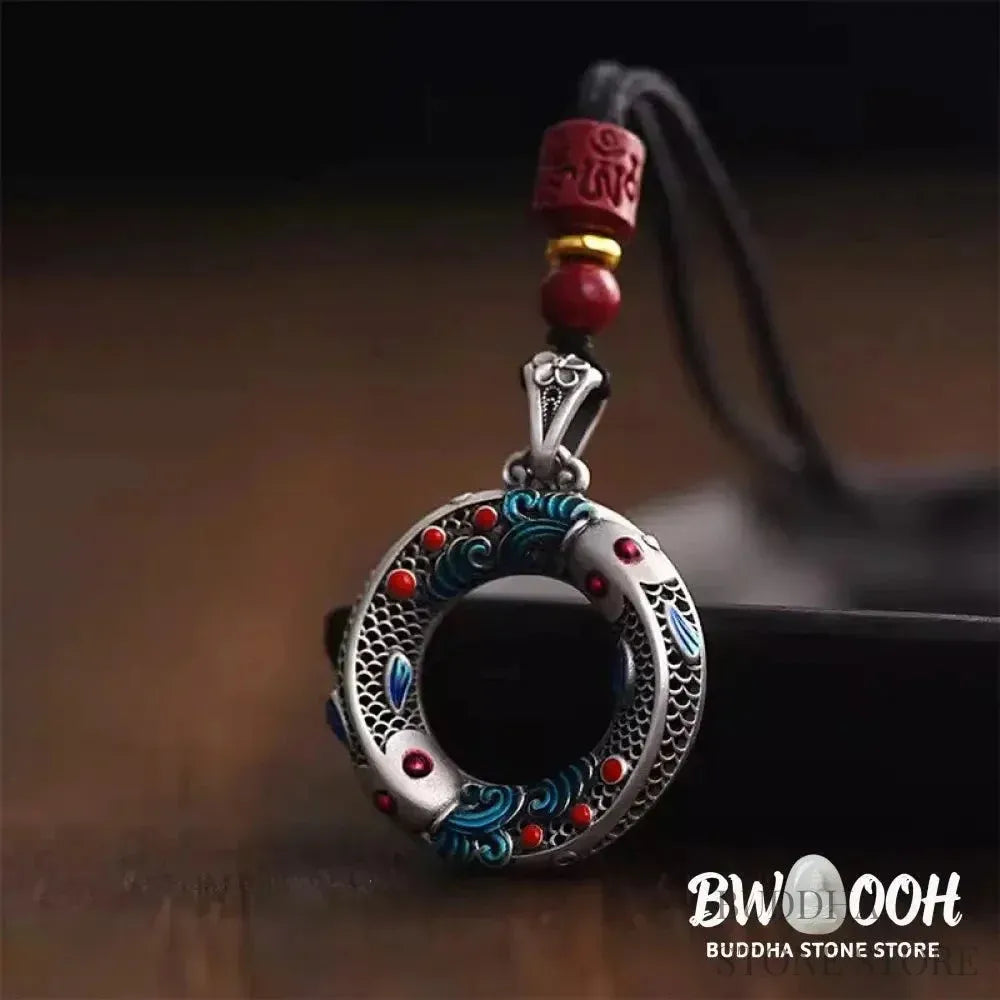BWOOOH handcrafted copper-plated gold Koi Fish Peace Buckle necklace pendant with rope and cinnabar accents, symbolizing wealth, luck, and spiritual tranquility. A detailed 4.1x2.9cm amulet for prosperity. - View 2