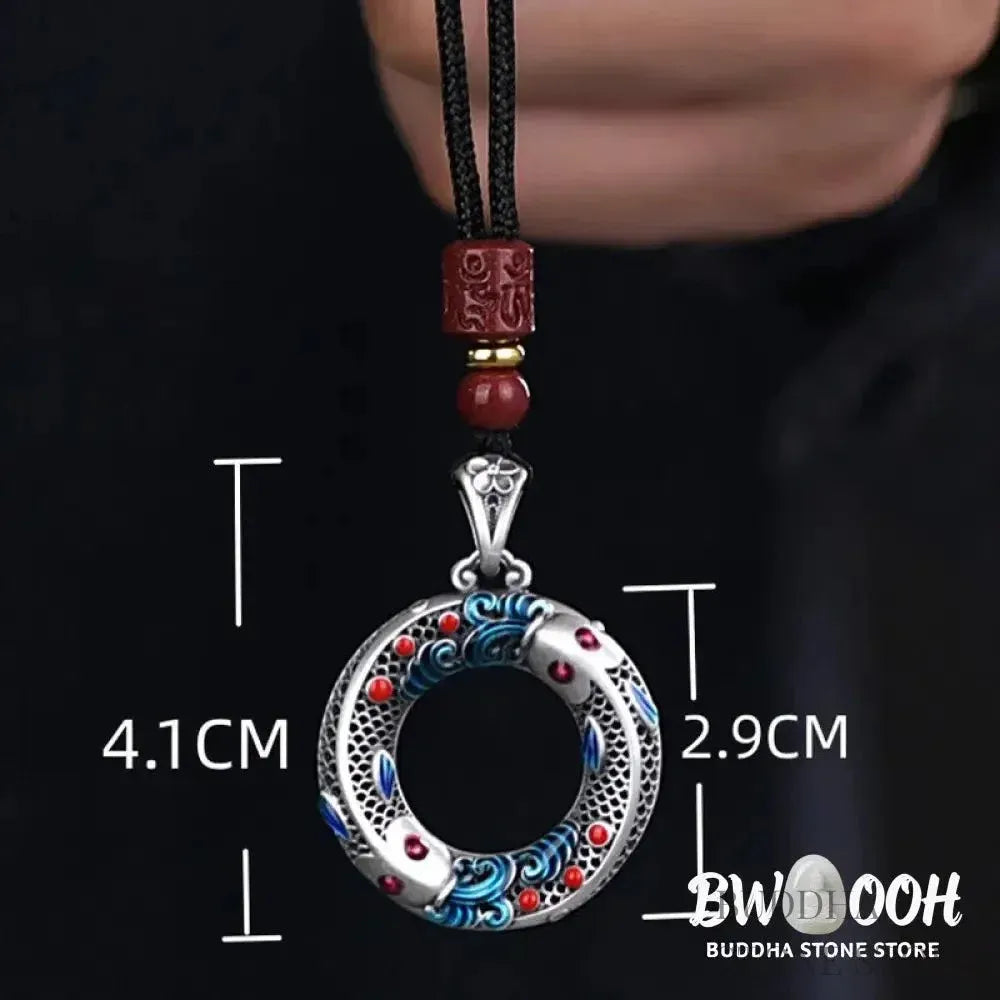 BWOOOH handcrafted copper-plated gold Koi Fish Peace Buckle necklace pendant with rope and cinnabar accents, symbolizing wealth, luck, and spiritual tranquility. A detailed 4.1x2.9cm amulet for prosperity. - View 7