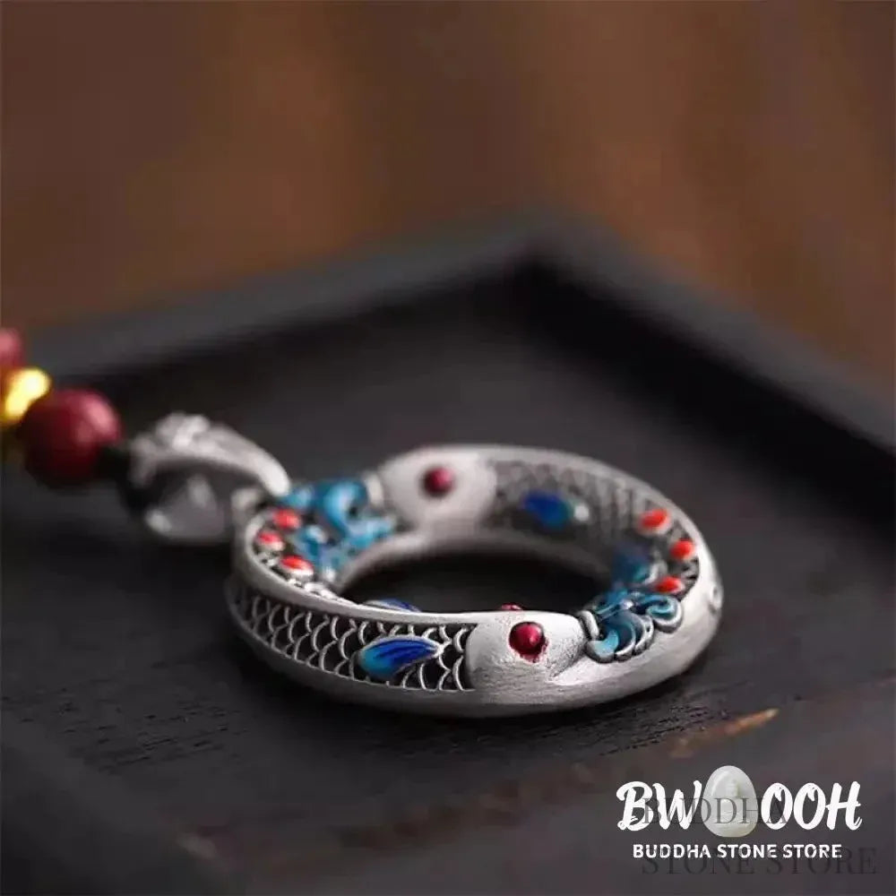BWOOOH handcrafted copper-plated gold Koi Fish Peace Buckle necklace pendant with rope and cinnabar accents, symbolizing wealth, luck, and spiritual tranquility. A detailed 4.1x2.9cm amulet for prosperity. - View 4