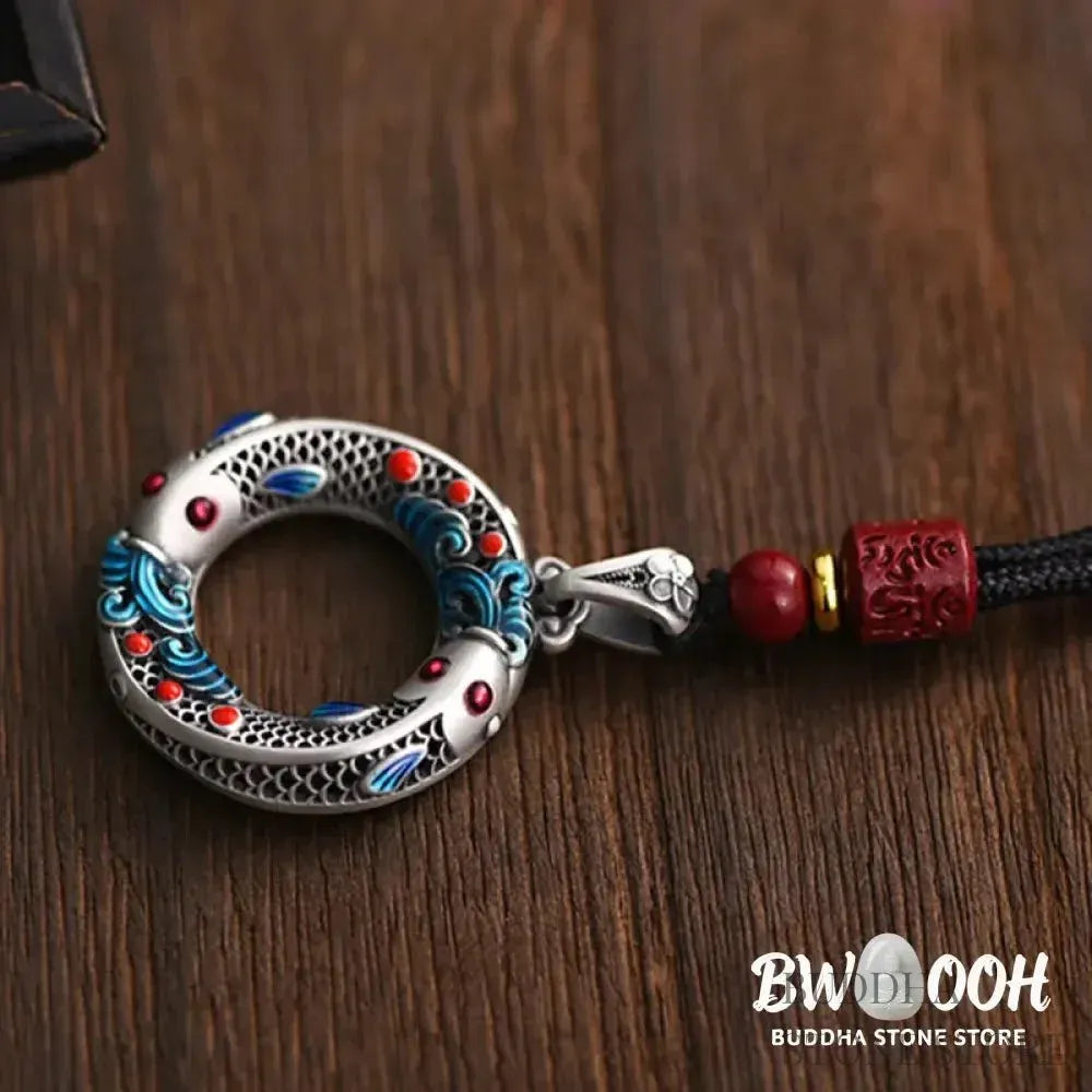 BWOOOH handcrafted copper-plated gold Koi Fish Peace Buckle necklace pendant with rope and cinnabar accents, symbolizing wealth, luck, and spiritual tranquility. A detailed 4.1x2.9cm amulet for prosperity. - View 5