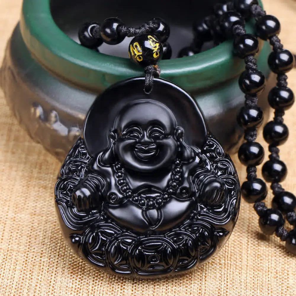 BWOOOH Laughing Buddha Black Obsidian pendant necklace, a unisex handmade spiritual amulet featuring a carved Laughing Buddha on a polished black obsidian stone, symbolizing strength, protection, and positive Feng Shui energy.