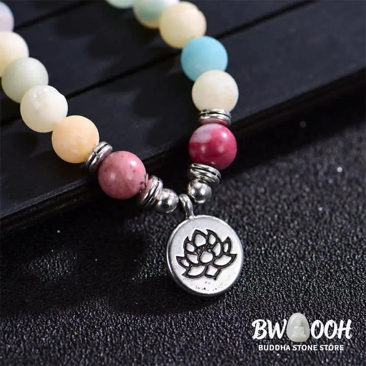 BWOOOH handcrafted 108-bead prayer bracelet featuring 8-8.5mm natural Lazurite, Picasso Jasper, Amazonite, Rhodonite, and Apatite stones on premium elastic string, adorned with a delicate Lotus symbol for spiritual balance and positive energy. - View 11