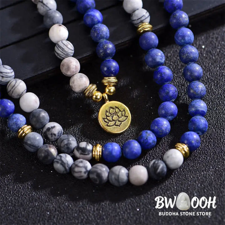BWOOOH handcrafted 108-bead prayer bracelet featuring 8-8.5mm natural Lazurite, Picasso Jasper, Amazonite, Rhodonite, and Apatite stones on premium elastic string, adorned with a delicate Lotus symbol for spiritual balance and positive energy. - View 4