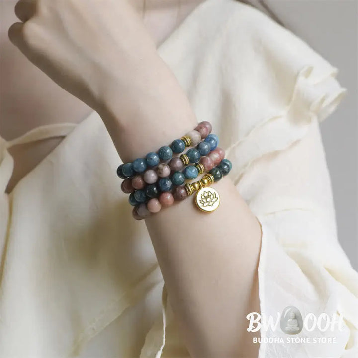 BWOOOH handcrafted 108-bead prayer bracelet featuring 8-8.5mm natural Lazurite, Picasso Jasper, Amazonite, Rhodonite, and Apatite stones on premium elastic string, adorned with a delicate Lotus symbol for spiritual balance and positive energy. - View 16