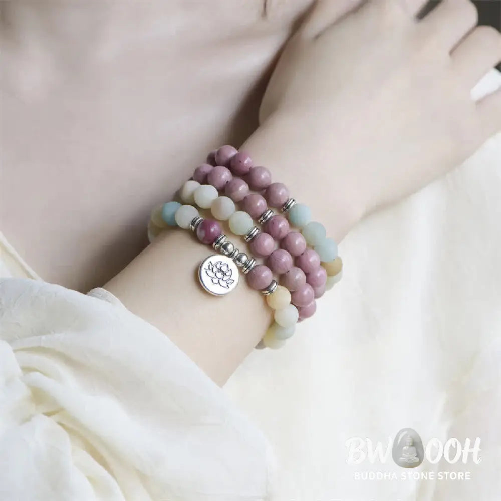 BWOOOH handcrafted 108-bead prayer bracelet featuring 8-8.5mm natural Lazurite, Picasso Jasper, Amazonite, Rhodonite, and Apatite stones on premium elastic string, adorned with a delicate Lotus symbol for spiritual balance and positive energy. - View 9