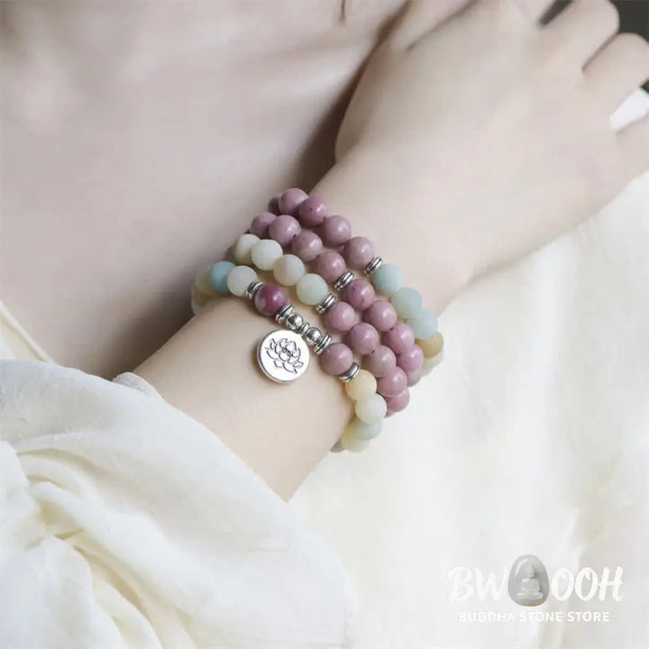 BWOOOH handcrafted 108-bead prayer bracelet featuring 8-8.5mm natural Lazurite, Picasso Jasper, Amazonite, Rhodonite, and Apatite stones on premium elastic string, adorned with a delicate Lotus symbol for spiritual balance and positive energy. - View 9