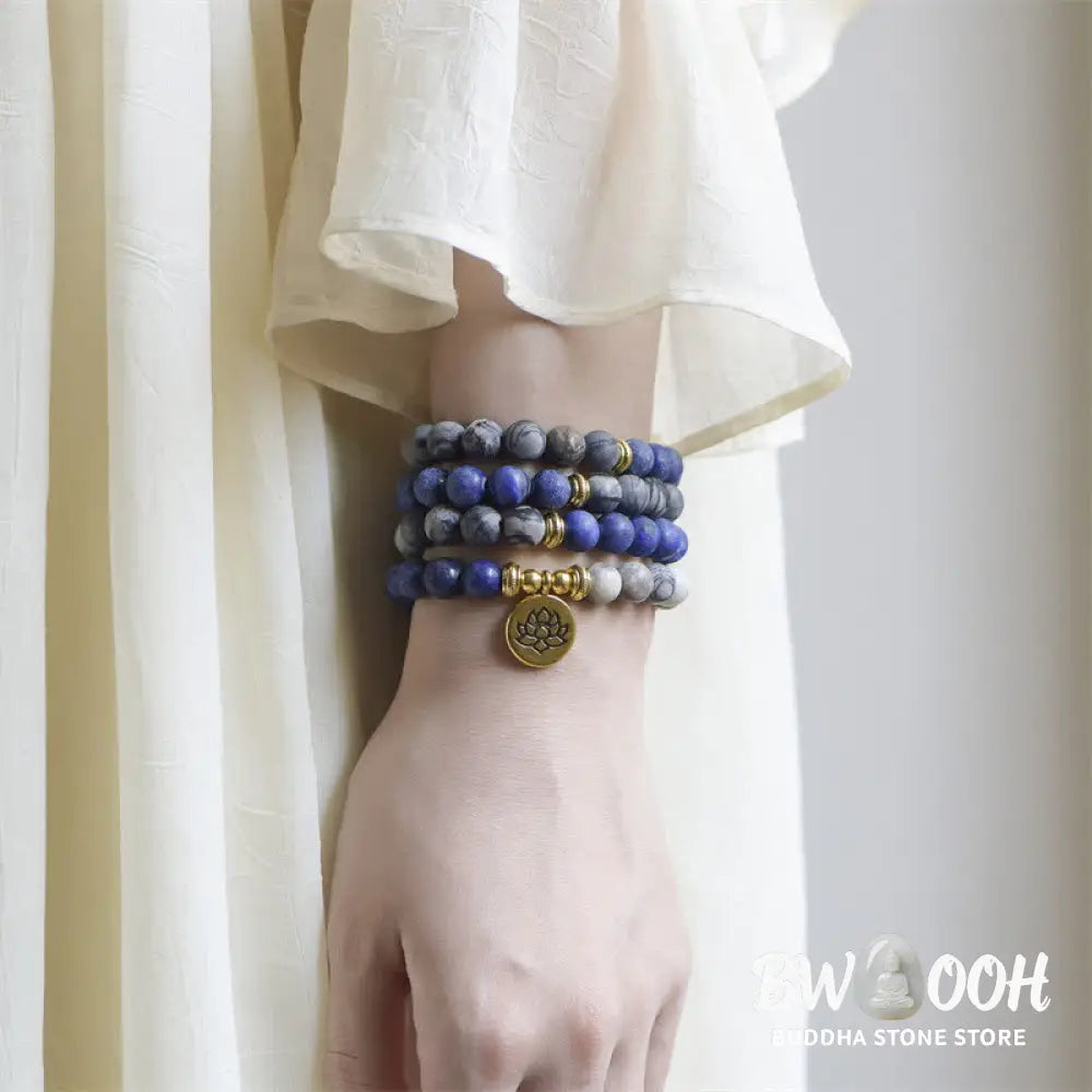 BWOOOH handcrafted 108-bead prayer bracelet featuring 8-8.5mm natural Lazurite, Picasso Jasper, Amazonite, Rhodonite, and Apatite stones on premium elastic string, adorned with a delicate Lotus symbol for spiritual balance and positive energy. - View 2