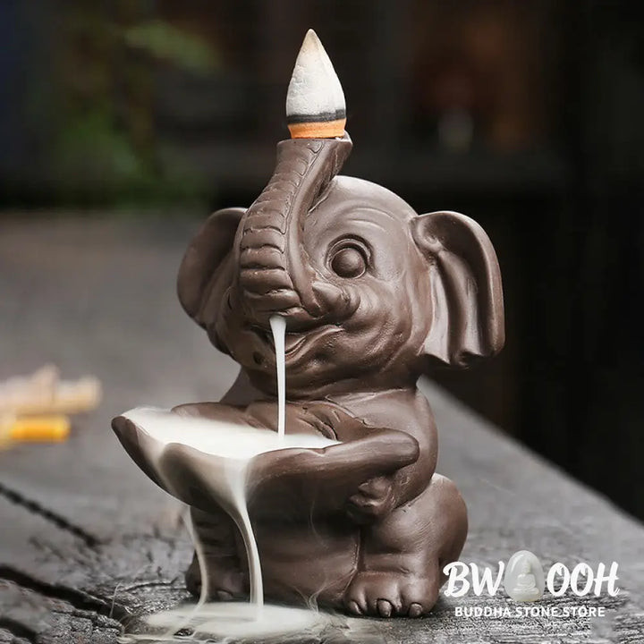 BWOOOH handcrafted backflow incense burner - Little Elephant Holding Leaf Purple