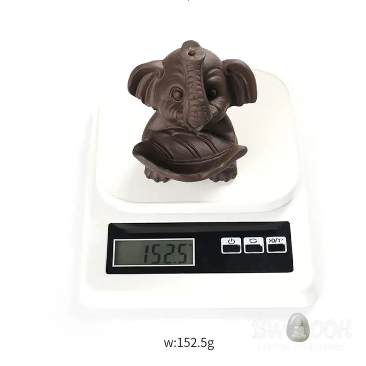 BWOOOH handcrafted backflow incense burner - Little Elephant Holding Leaf Purple