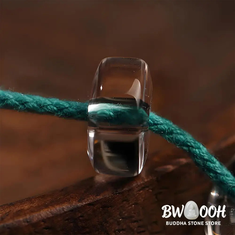 A BWOOOH Liuli 108 Flat Beads Spiral Rope Wisdom Mala, featuring translucent, multi-colored Liuli glass beads crafted with incense ash. The mala is shown wrapped several times around a wrist, ready for meditation and spiritual focus. - View 8