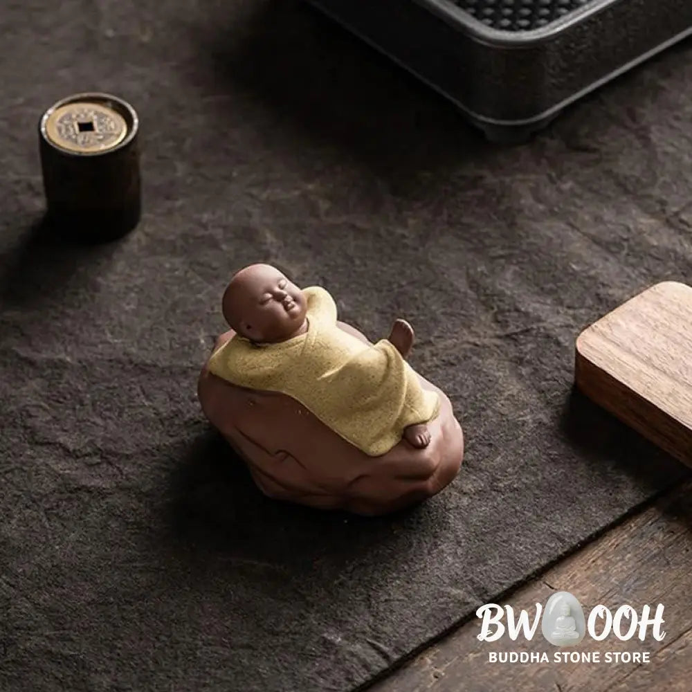BWOOOH handcrafted Buddha statue - Looking Up Resting Monk Ceramic Sta