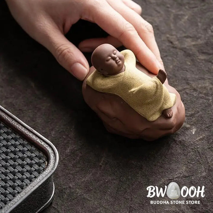 BWOOOH handcrafted Buddha statue - Looking Up Resting Monk Ceramic Sta