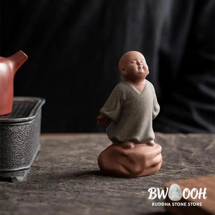 BWOOOH handcrafted Buddha statue - Looking Up Resting Monk Ceramic Sta