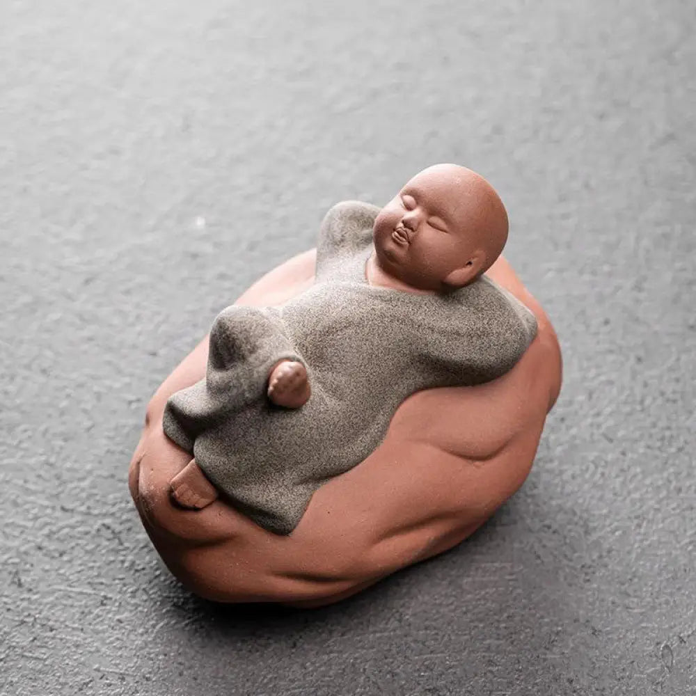 BWOOOH handcrafted Buddha statue - Looking Up Resting Monk Ceramic Sta