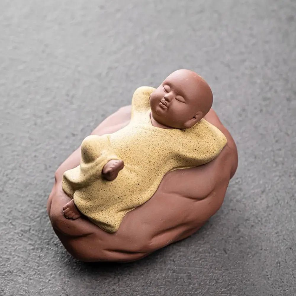 BWOOOH handcrafted Buddha statue - Looking Up Resting Monk Ceramic Sta