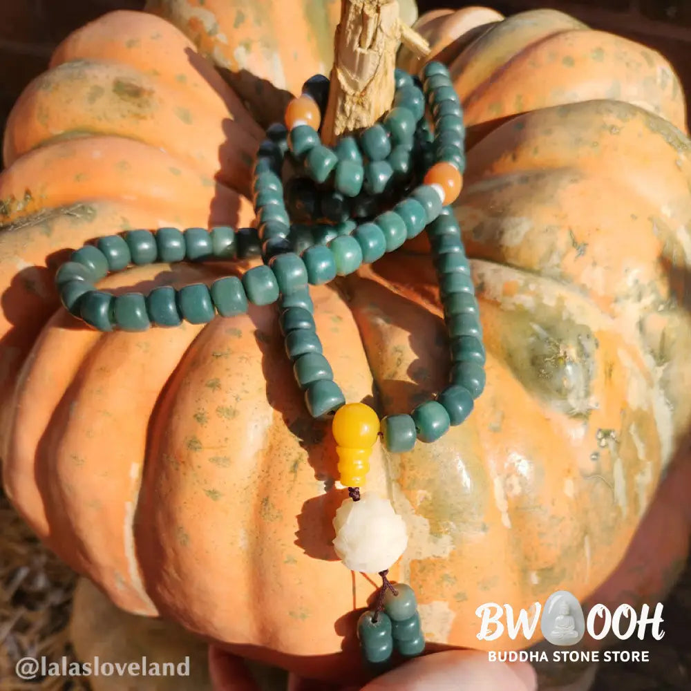 BWOOOH Lotus Cyan Bodhi Seed Success Bracelet showcasing 108 dark-speckled Bodhi seeds and an elegant Lotus symbol. Handcrafted unisex spiritual mala for wisdom, peace, and resilience. - View 3