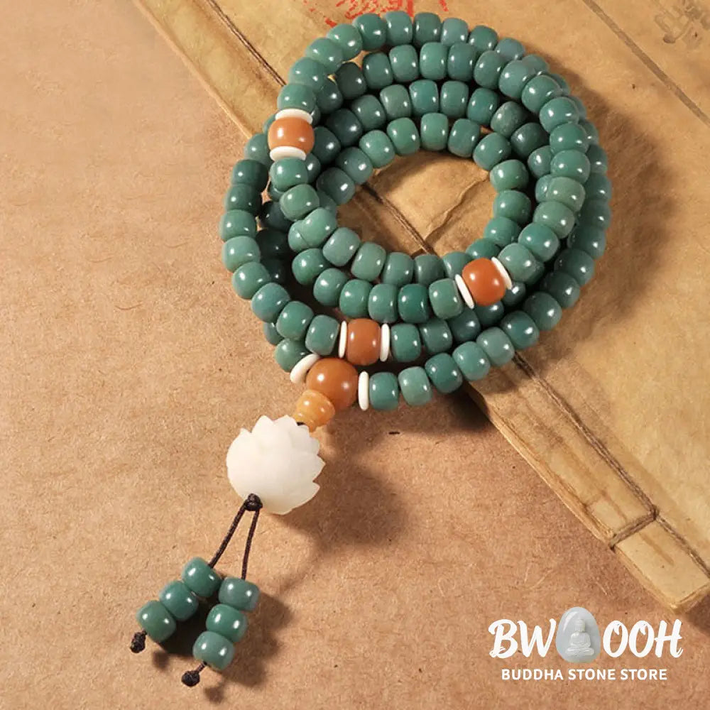 BWOOOH Lotus Cyan Bodhi Seed Success Bracelet showcasing 108 dark-speckled Bodhi seeds and an elegant Lotus symbol. Handcrafted unisex spiritual mala for wisdom, peace, and resilience. - View 2