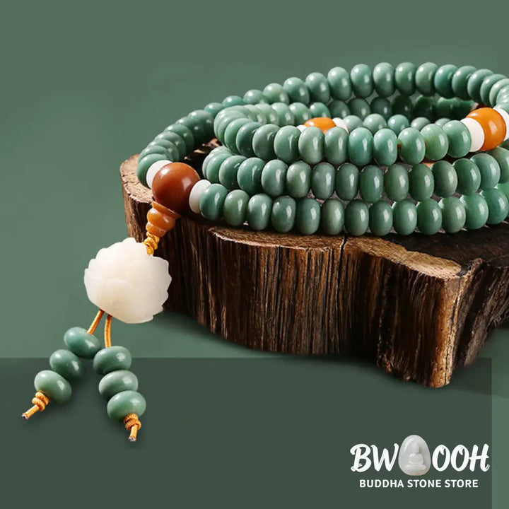 BWOOOH Lotus Cyan Bodhi Seed Success Bracelet showcasing 108 dark-speckled Bodhi seeds and an elegant Lotus symbol. Handcrafted unisex spiritual mala for wisdom, peace, and resilience. - View 7