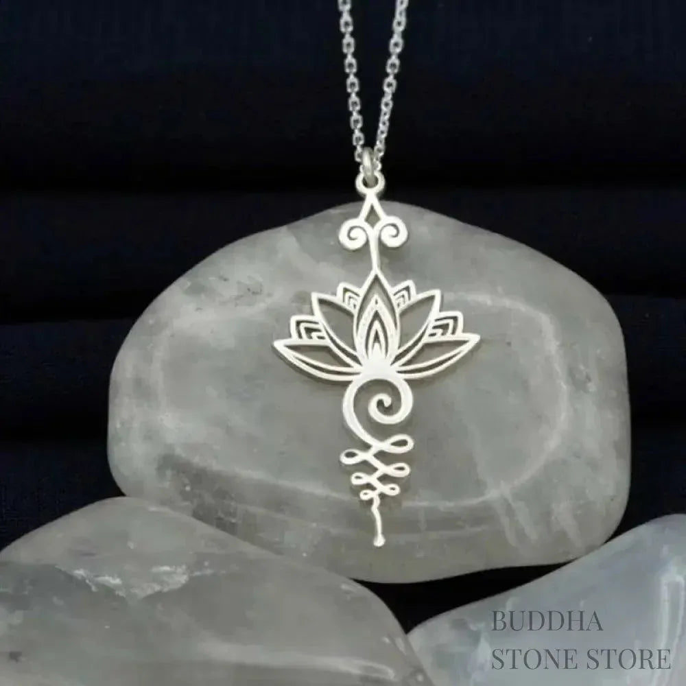 BWOOOH Lotus Luck Wealth Necklace Pendant crafted from durable titanium alloy, featuring an elegant lotus flower design. Available in lustrous silver, gold, and peachpuff finishes, symbolizing enlightenment and spiritual new beginnings.