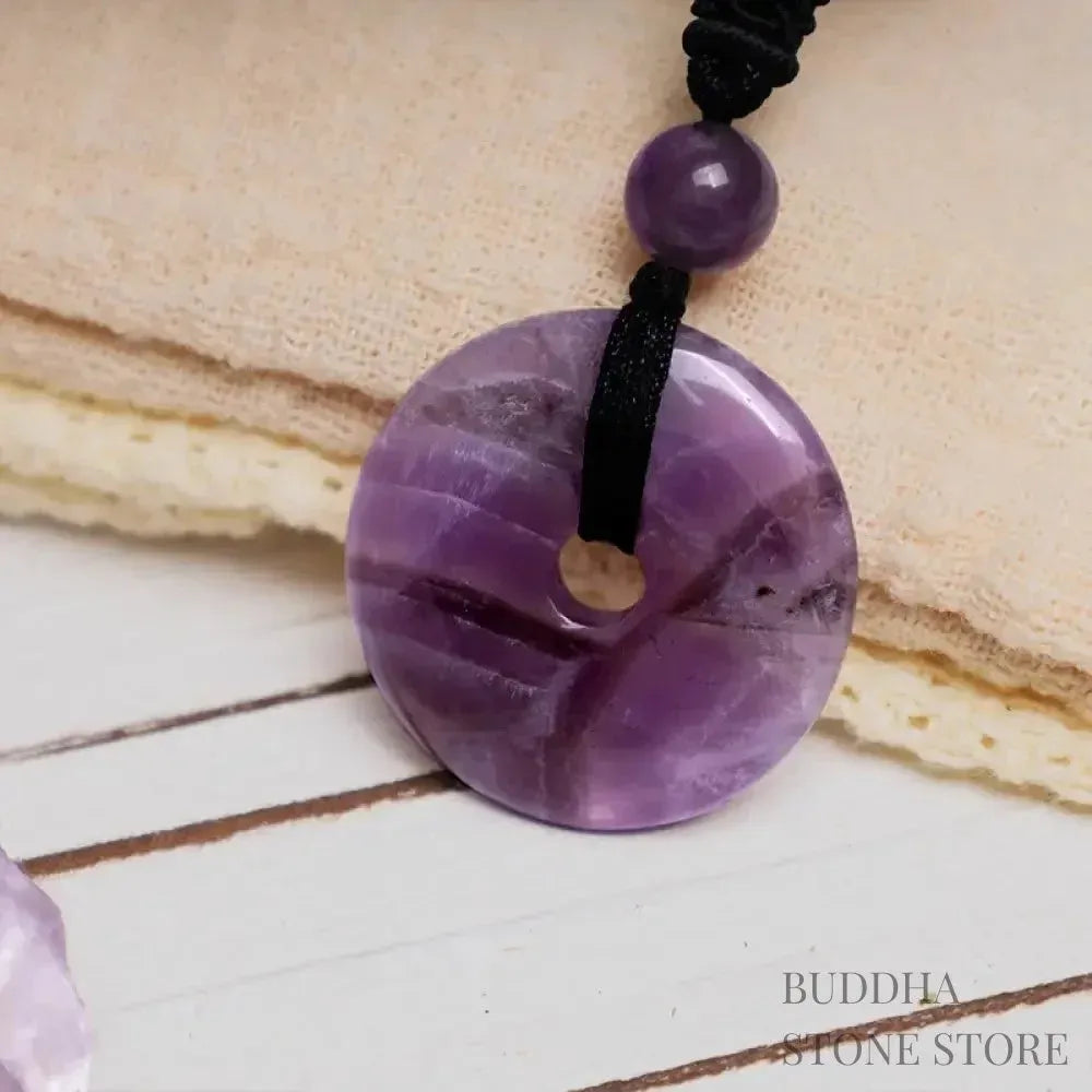 A BWOOOH Lucky Coin Pendant Necklace featuring a round, polished gemstone pendant, approximately 1.18 inches in diameter, suspended on a 26-inch chain, showcasing materials such as Green Aventurine, Pink Crystal, Black Onyx, and Jade, designed for spiritual wellness and good fortune. - View 6