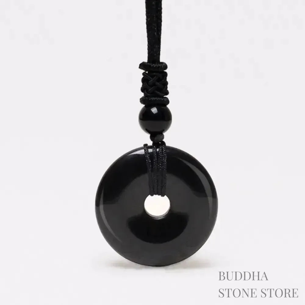 A BWOOOH Lucky Coin Pendant Necklace featuring a round, polished gemstone pendant, approximately 1.18 inches in diameter, suspended on a 26-inch chain, showcasing materials such as Green Aventurine, Pink Crystal, Black Onyx, and Jade, designed for spiritual wellness and good fortune. - View 14