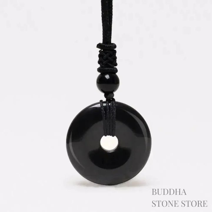 A BWOOOH Lucky Coin Pendant Necklace featuring a round, polished gemstone pendant, approximately 1.18 inches in diameter, suspended on a 26-inch chain, showcasing materials such as Green Aventurine, Pink Crystal, Black Onyx, and Jade, designed for spiritual wellness and good fortune. - View 14