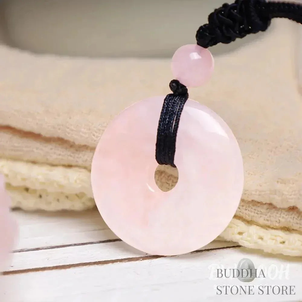 A BWOOOH Lucky Coin Pendant Necklace featuring a round, polished gemstone pendant, approximately 1.18 inches in diameter, suspended on a 26-inch chain, showcasing materials such as Green Aventurine, Pink Crystal, Black Onyx, and Jade, designed for spiritual wellness and good fortune. - View 11