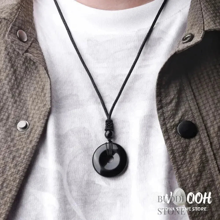 A BWOOOH Lucky Coin Pendant Necklace featuring a round, polished gemstone pendant, approximately 1.18 inches in diameter, suspended on a 26-inch chain, showcasing materials such as Green Aventurine, Pink Crystal, Black Onyx, and Jade, designed for spiritual wellness and good fortune. - View 17