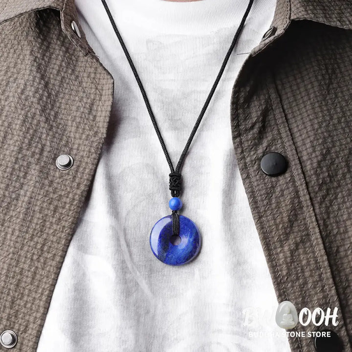 A BWOOOH Lucky Coin Pendant Necklace featuring a round, polished gemstone pendant, approximately 1.18 inches in diameter, suspended on a 26-inch chain, showcasing materials such as Green Aventurine, Pink Crystal, Black Onyx, and Jade, designed for spiritual wellness and good fortune. - View 30