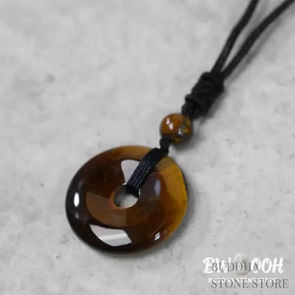 A BWOOOH Lucky Coin Pendant Necklace featuring a round, polished gemstone pendant, approximately 1.18 inches in diameter, suspended on a 26-inch chain, showcasing materials such as Green Aventurine, Pink Crystal, Black Onyx, and Jade, designed for spiritual wellness and good fortune. - View 21