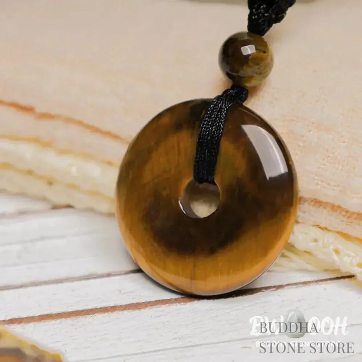 A BWOOOH Lucky Coin Pendant Necklace featuring a round, polished gemstone pendant, approximately 1.18 inches in diameter, suspended on a 26-inch chain, showcasing materials such as Green Aventurine, Pink Crystal, Black Onyx, and Jade, designed for spiritual wellness and good fortune. - View 20