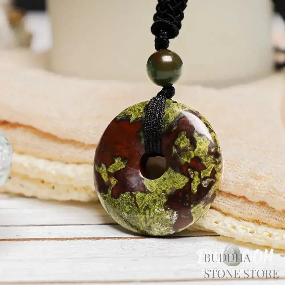A BWOOOH Lucky Coin Pendant Necklace featuring a round, polished gemstone pendant, approximately 1.18 inches in diameter, suspended on a 26-inch chain, showcasing materials such as Green Aventurine, Pink Crystal, Black Onyx, and Jade, designed for spiritual wellness and good fortune. - View 26