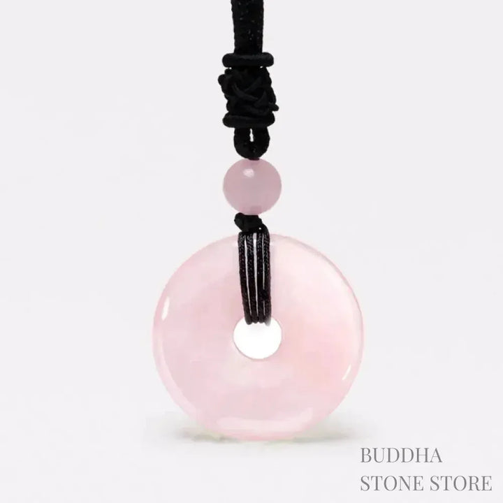 A BWOOOH Lucky Coin Pendant Necklace featuring a round, polished gemstone pendant, approximately 1.18 inches in diameter, suspended on a 26-inch chain, showcasing materials such as Green Aventurine, Pink Crystal, Black Onyx, and Jade, designed for spiritual wellness and good fortune. - View 10