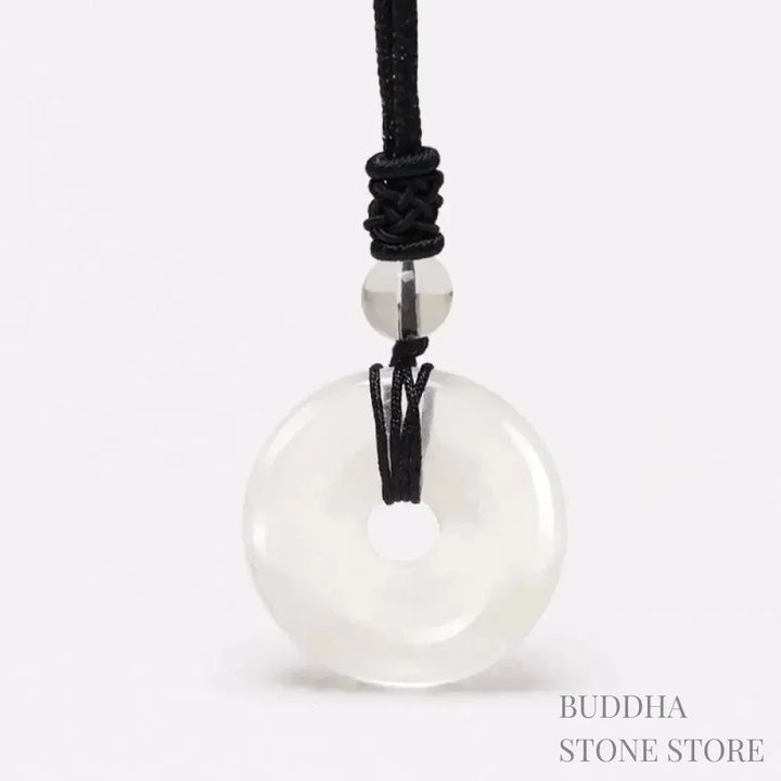 A BWOOOH Lucky Coin Pendant Necklace featuring a round, polished gemstone pendant, approximately 1.18 inches in diameter, suspended on a 26-inch chain, showcasing materials such as Green Aventurine, Pink Crystal, Black Onyx, and Jade, designed for spiritual wellness and good fortune. - View 32