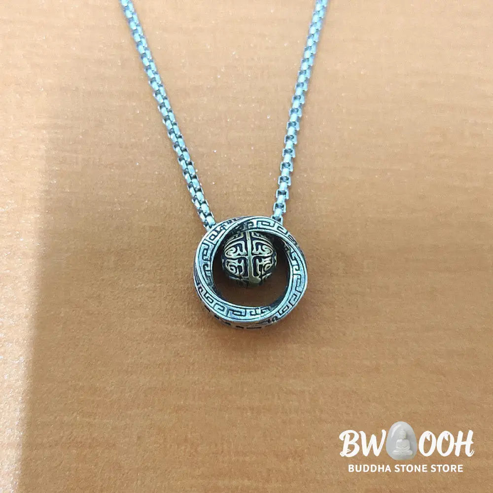 A close-up of the BWOOOH Mobius Lucky Bead Copper Wealth Necklace Pendant, featuring a polished 20mm Mobius copper symbol on a 60cm chain, evoking spiritual grounding and prosperity. - View 8