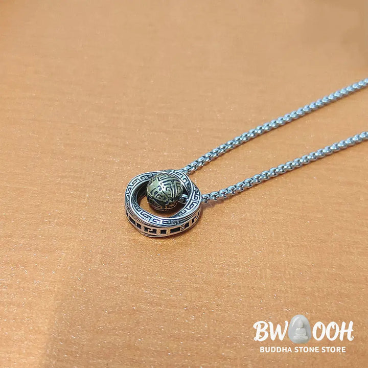 A close-up of the BWOOOH Mobius Lucky Bead Copper Wealth Necklace Pendant, featuring a polished 20mm Mobius copper symbol on a 60cm chain, evoking spiritual grounding and prosperity. - View 9