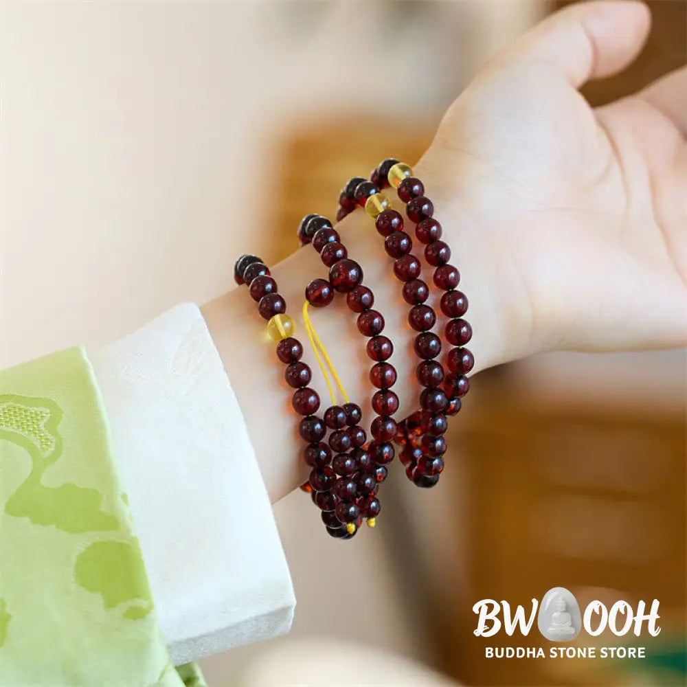 BWOOOH Natural Amber 108 Mala Beads anxiety bracelet featuring clear, luminous 6.5mm amber beads on premium string, designed for meditation and focus. - View 2