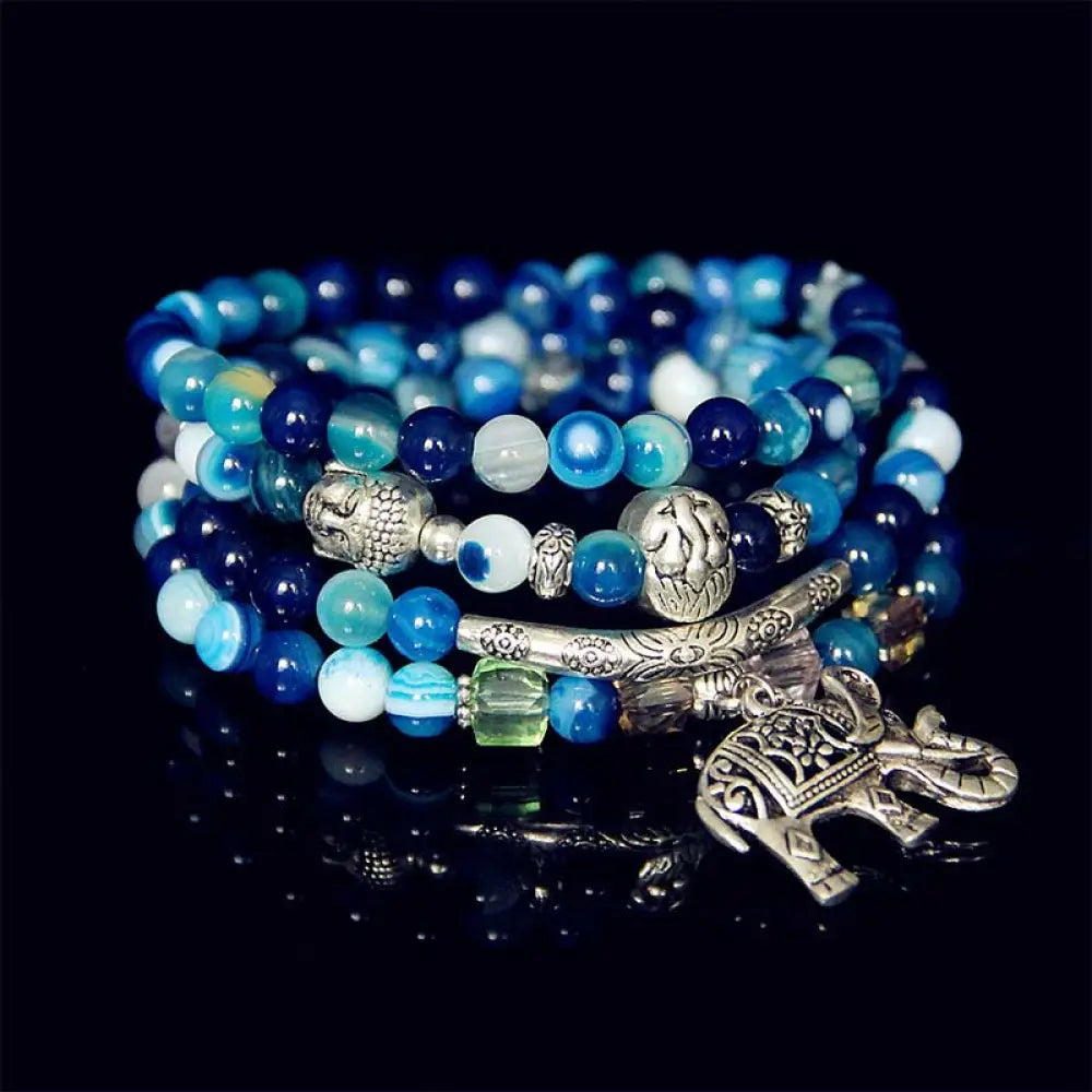 BWOOOH Natural Agate Elephant Hope Bracelet featuring polished 6mm blue, purple, and green agate beads with a 999 silver-plated copper chain, showcasing the Elephant symbol for wisdom and strength, a handmade spiritual jewelry piece.