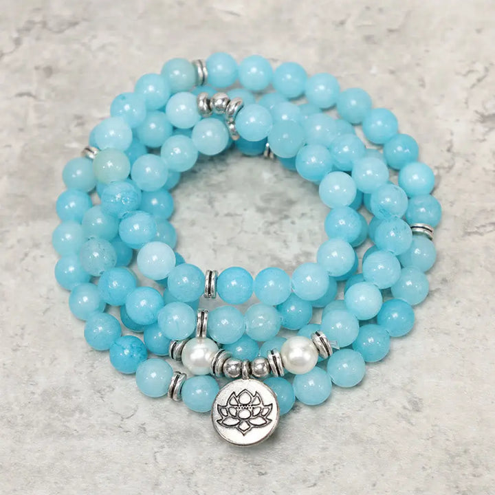 BWOOOH Natural Amazonite Stone Healing Lotus Mala Bracelet, featuring 108 polished 8mm blue Amazonite beads on premium elastic, with an elegant silver-toned lotus symbol charm, ideal for meditation and spiritual balance.
