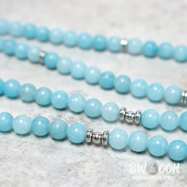 BWOOOH Natural Amazonite Stone Healing Lotus Mala Bracelet, featuring 108 polished 8mm blue Amazonite beads on premium elastic, with an elegant silver-toned lotus symbol charm, ideal for meditation and spiritual balance. - View 5