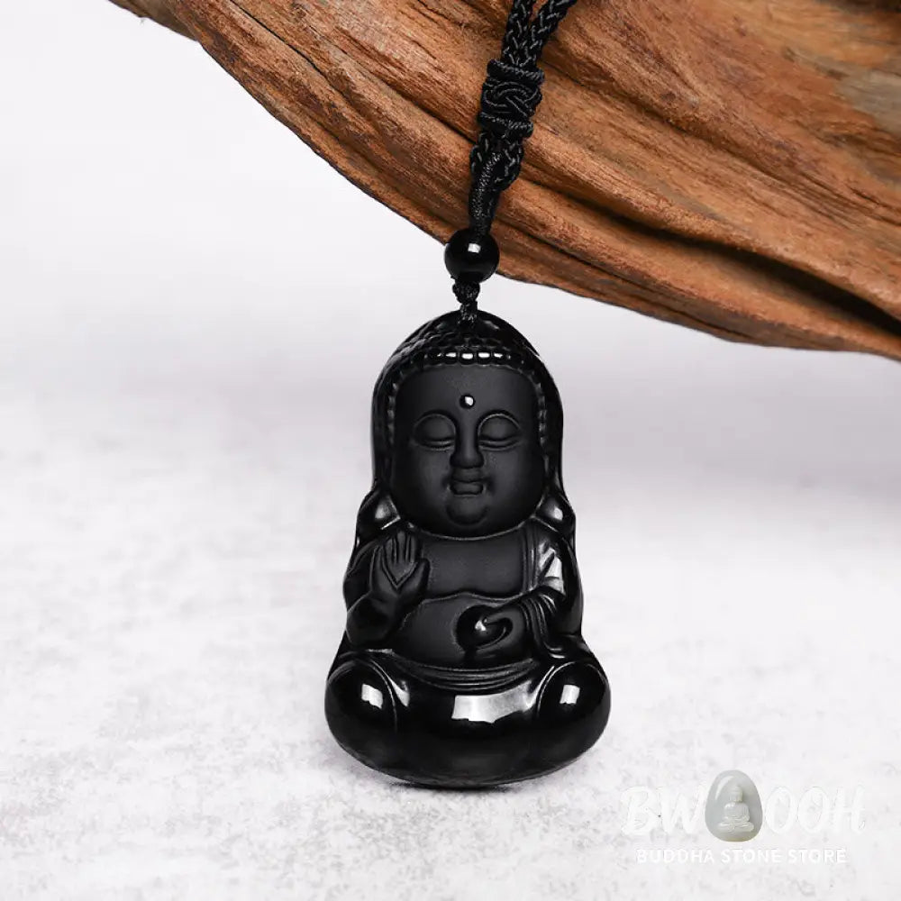 A BWOOOH Natural Black Obsidian Crystal Buddha Strength Protection Amulet Lucky Charm Pendant Necklace, featuring a 5.3x3.1cm carved Buddha pendant on a 64cm perimeter necklace, against a neutral background. - View 4