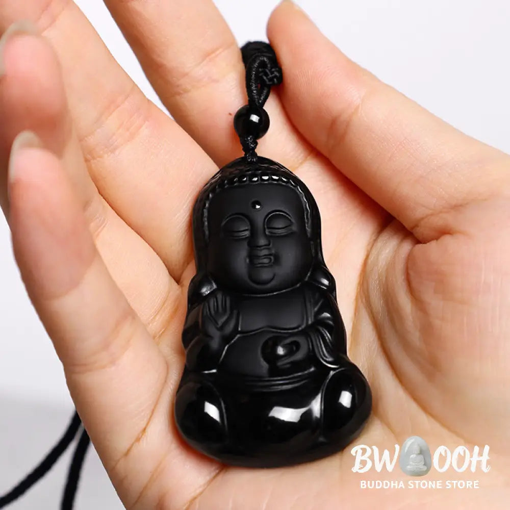 A BWOOOH Natural Black Obsidian Crystal Buddha Strength Protection Amulet Lucky Charm Pendant Necklace, featuring a 5.3x3.1cm carved Buddha pendant on a 64cm perimeter necklace, against a neutral background. - View 5