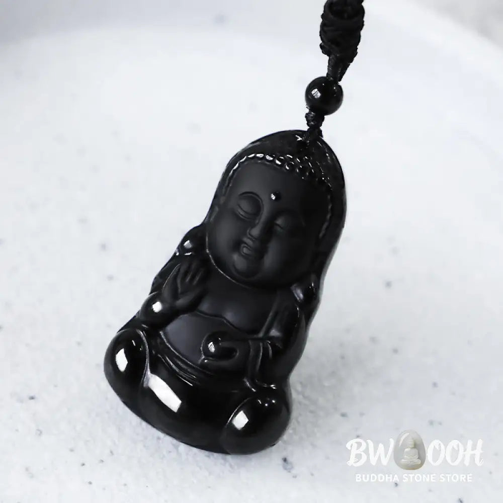 A BWOOOH Natural Black Obsidian Crystal Buddha Strength Protection Amulet Lucky Charm Pendant Necklace, featuring a 5.3x3.1cm carved Buddha pendant on a 64cm perimeter necklace, against a neutral background. - View 7