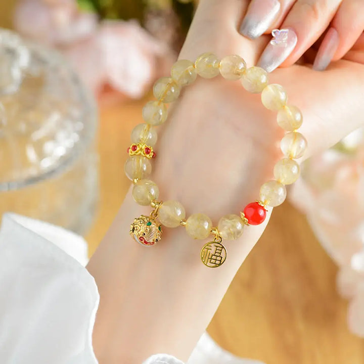 BWOOOH Natural Golden Rutilated Quartz Fu Character Charm Bell Wealth Bracelet - BWOOOH - Rutilated