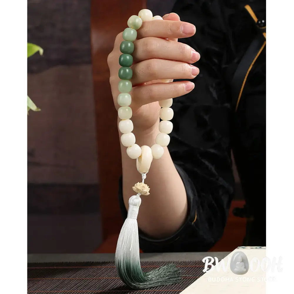 BWOOOH Natural Gradient Bodhi Seed Fortune Money Bag Lotus Wisdom Tassel Wrist Mala featuring 12mm dark-speckled bodhi seeds, boxwood, agate, and green aventurine; a handcrafted spiritual meditation bracelet for wisdom and calm. - View 19